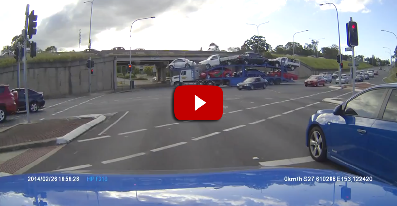 Car Hauler Versus Low Overpass.  Only One Can Win.
