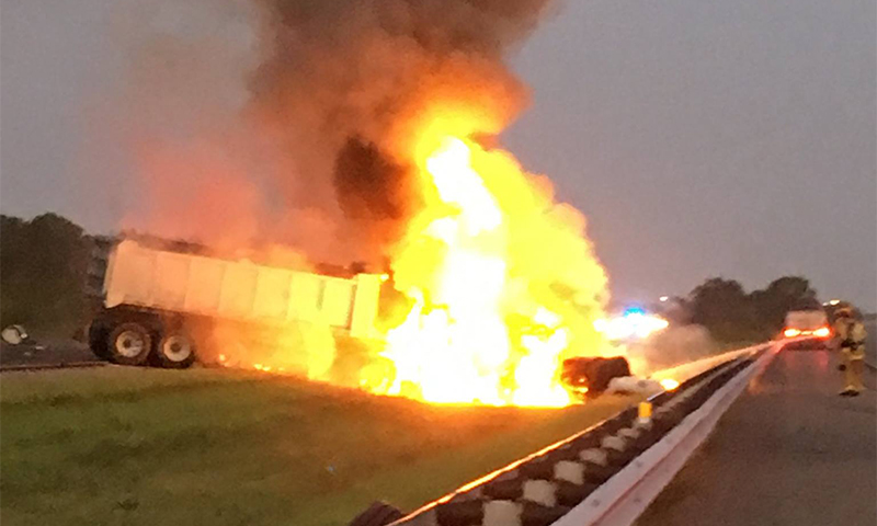 Off-duty police officer pulls trucker to safety moments before rig explodes