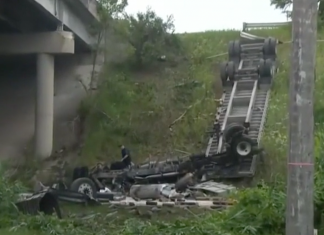 Semi truck driver miraculously survives after flipping big rig off overpass