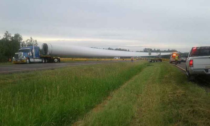 U-turn gets the best of trucker hauling oversized load