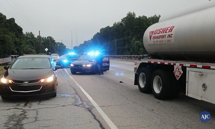 Pedestrian cited after being struck by oncoming tractor trailer