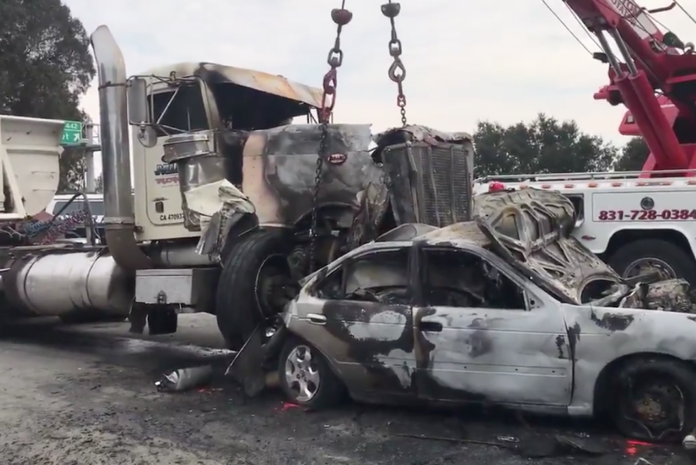 Witnesses say big rig's brakes were smoking before it plowed into 20 other vehicles