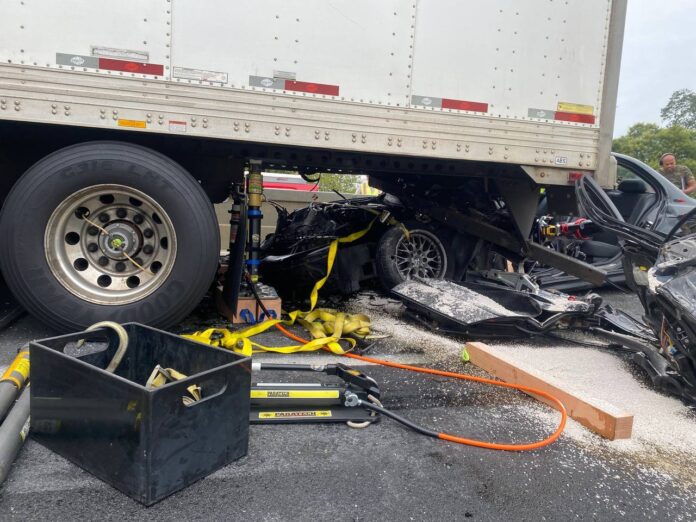 Crash leaves car WEDGED under semi trailer, Pennsylvania firefighters say