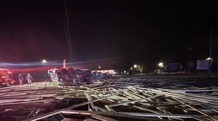 Driver RESCUED after CMV hauling lumber toppled on Louisiana highway