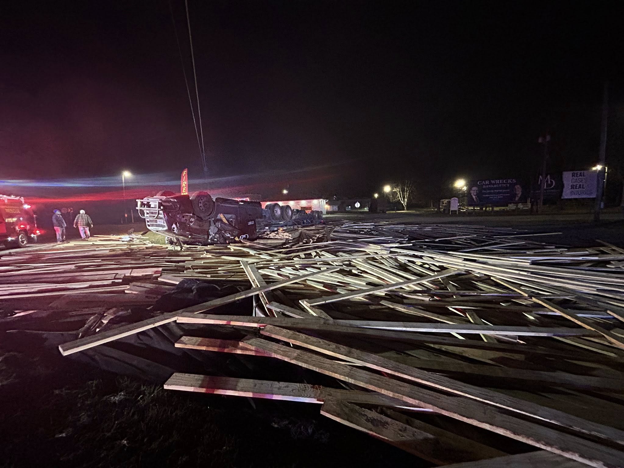 Driver RESCUED after CMV hauling lumber toppled on Louisiana highway