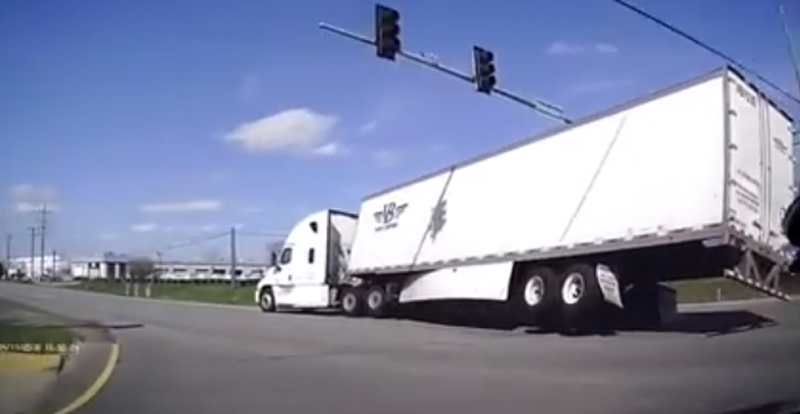 Semi truck’s load shifted while making a turn.  This was the result.