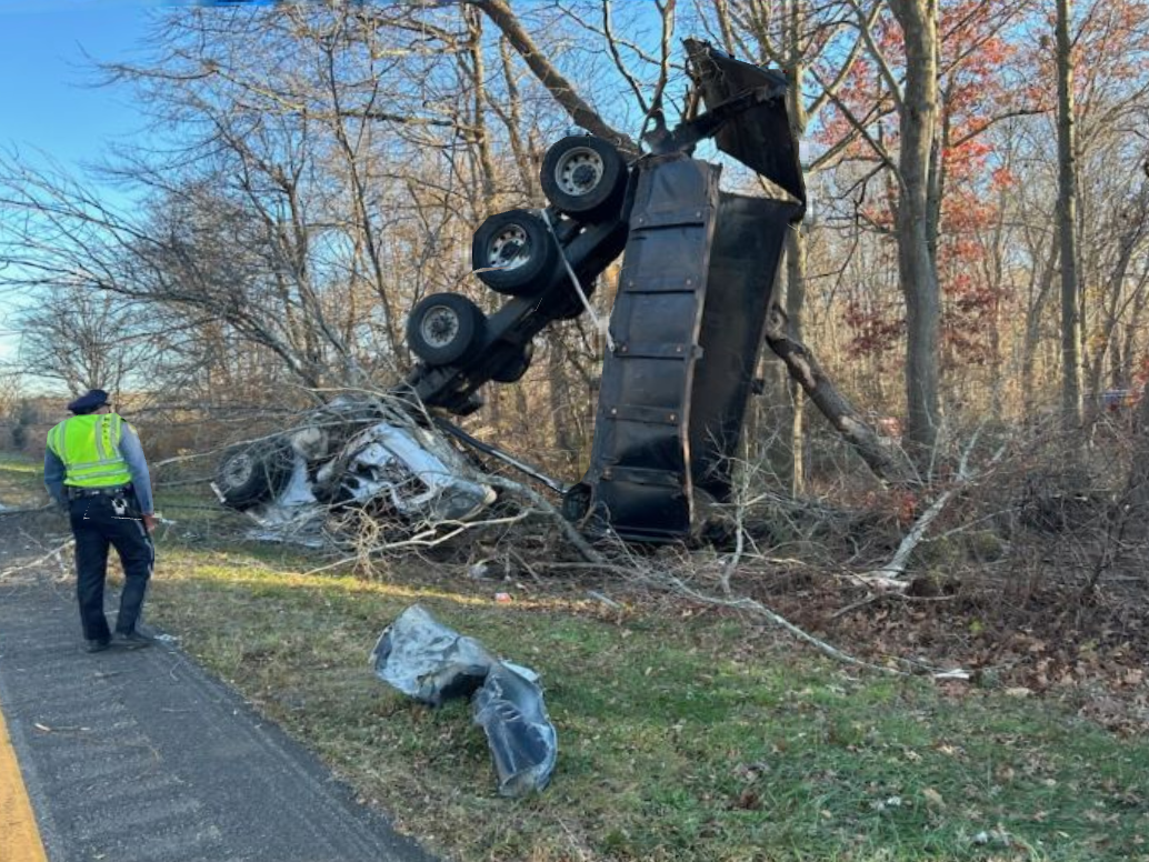 Steer tire BLOWOUT crash leaves dump truck twisted like a pretzel