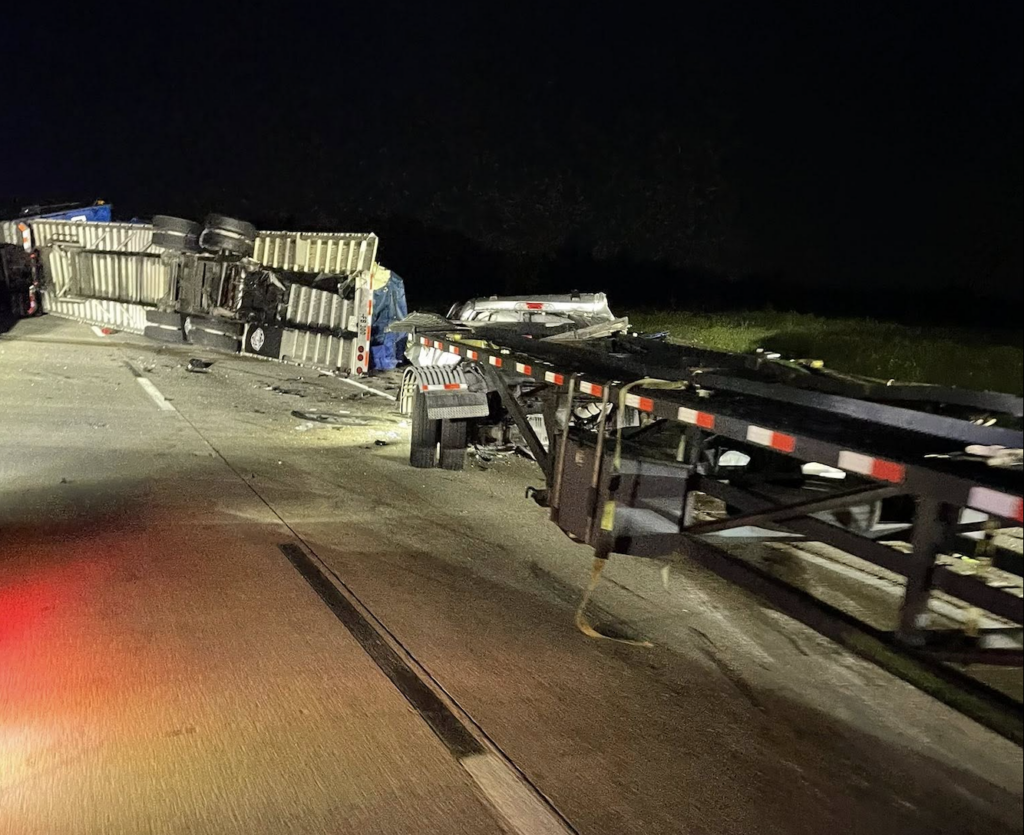Big rig trying to avoid crashed vehicle REAR-ENDED by car hauler on Oklahoma interstate
