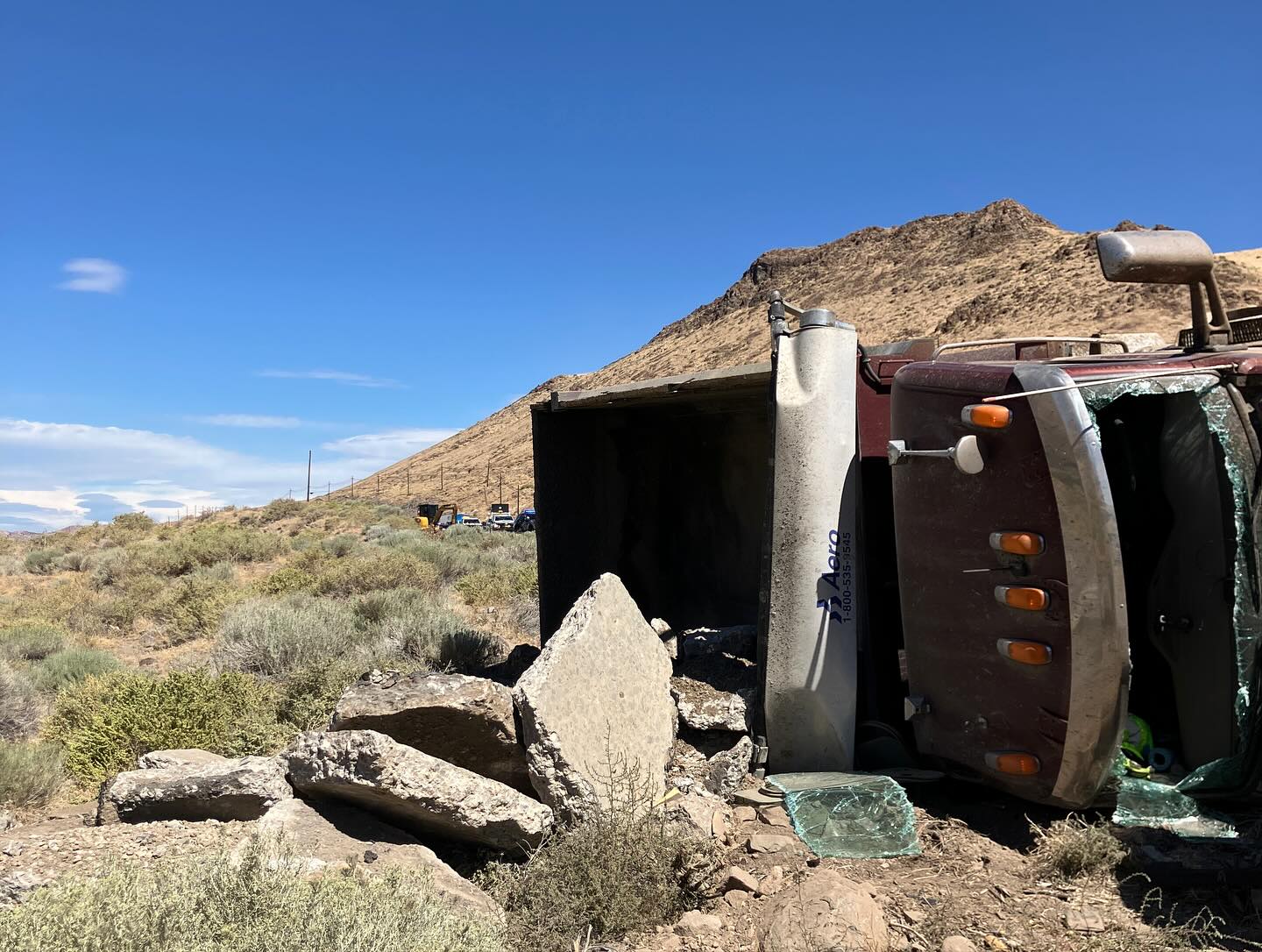 Dump truck rollover crash DESTROYS 200 feet of guardrail, Nevada troopers say