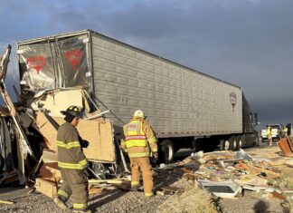 Powerful winds TOPPLE RV trailer, send it crashing into parked big rig on Utah interstate