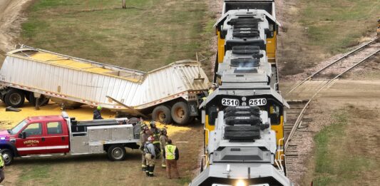 Police say grain truck driver ‘FAILED TO YEILD’ to train, resulting in crash and cargo spill