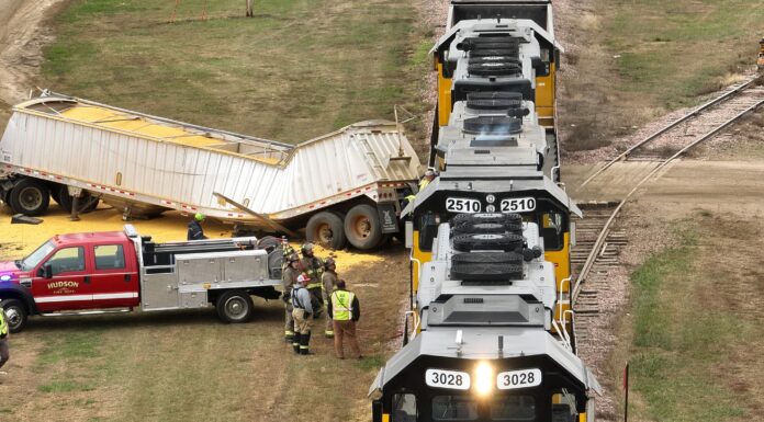 Police say grain truck driver ‘FAILED TO YEILD’ to train, resulting in crash and cargo spill
