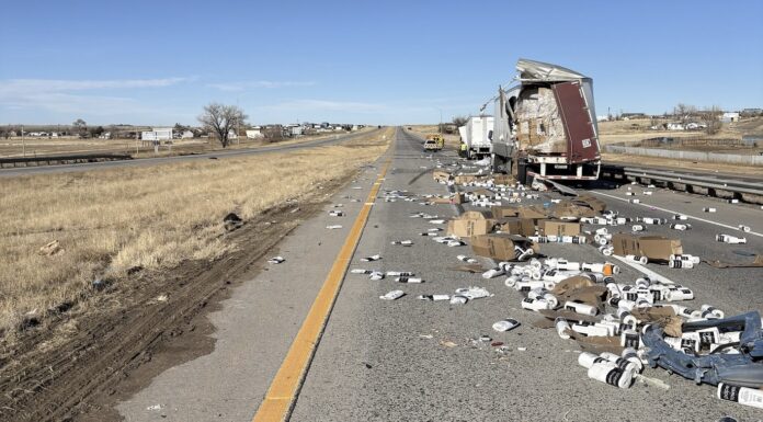 I-70 in Colorado STREWN with paper towels and tires after two semi truck crash