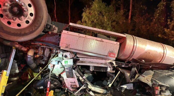 Truck driver extricated after semi truck ROLLS near North Carolina bridge
